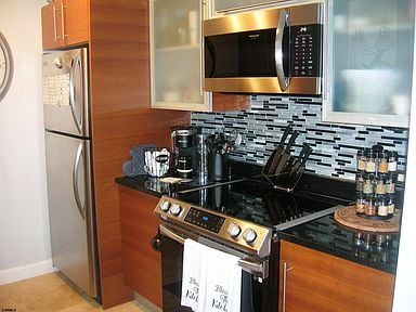 Building Photo - Stunning, Fully Renovated 2BR/2BA Condo at Bella – Steps from the Beach & Boardwalk