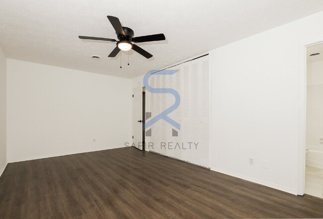 Building Photo - Move in before December 31st and choose your reward: a $250 Amazon Gift Card or a 55" Smart TV!