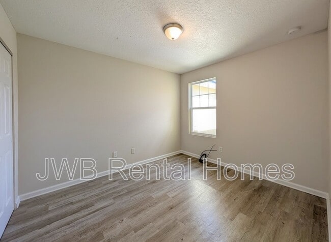 Building Photo - 7820 Playschool Ln
