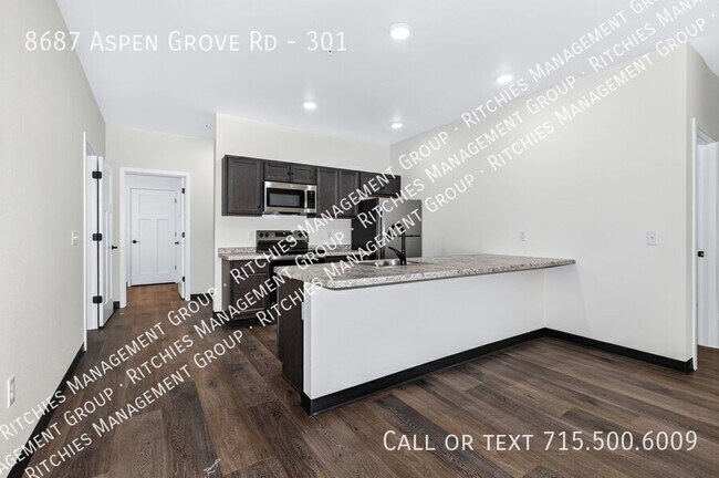 Building Photo - 8687 Aspen Ln
