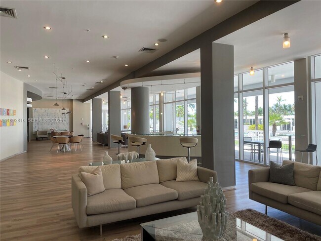 Building Photo - 10275 Collins Ave