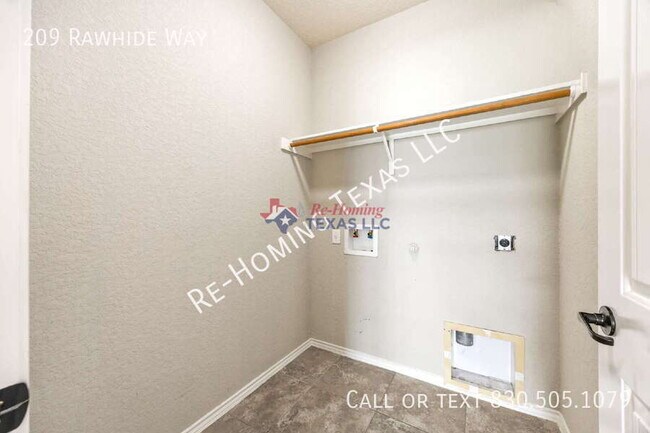 Building Photo - 209 Rawhide Way