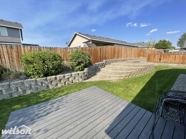 Building Photo - 3 Bed, 2 Bath Home with a Two-Car Garage, Fenced Backyard, and Lawn Care Included