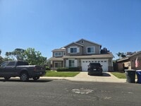 Building Photo - 6 BR's, 3 Bathrooms with a pool and spa av...