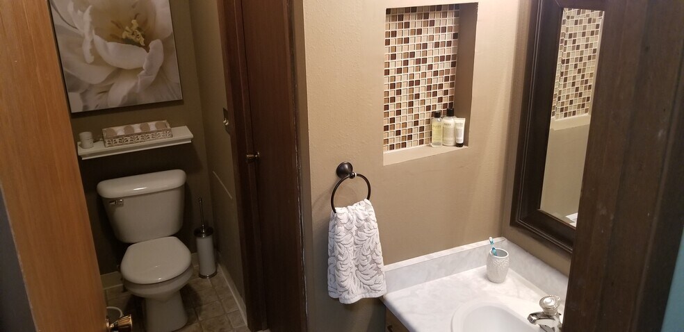 1/2 Bath - door leads to shower area - 5325 Brody Dr