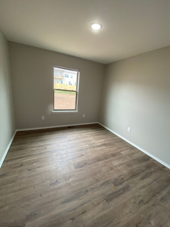 Building Photo - Comfortable four-bedroom home.