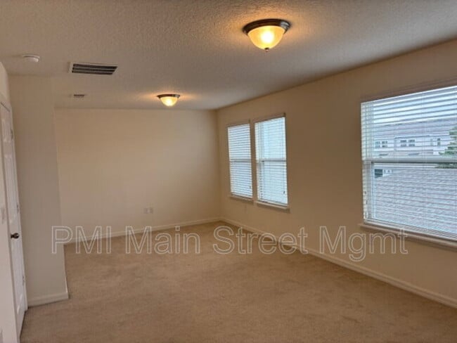 Building Photo - 8130 Red Stopper Ln