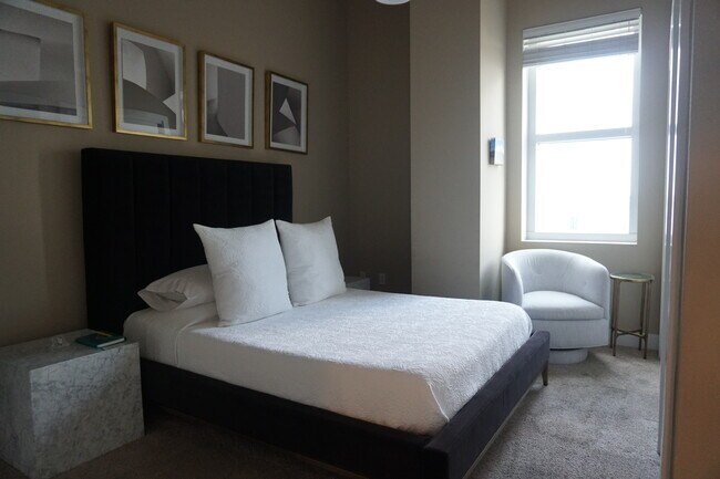 Marble side tables, custom bed, and side chair book - 1208 E Kennedy Blvd