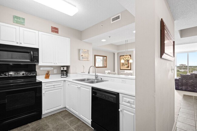Building Photo - Spacious 3BR/3BA Coastal Retreat at Harbour Pointe – Utilities Included!