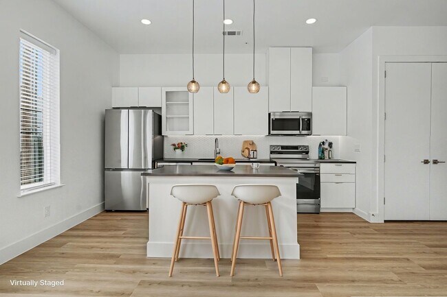 Building Photo - Be the first to live in Unit 203 at 2217 Fitzhugh—a brand-new 2026 construction offering 628 sq f...