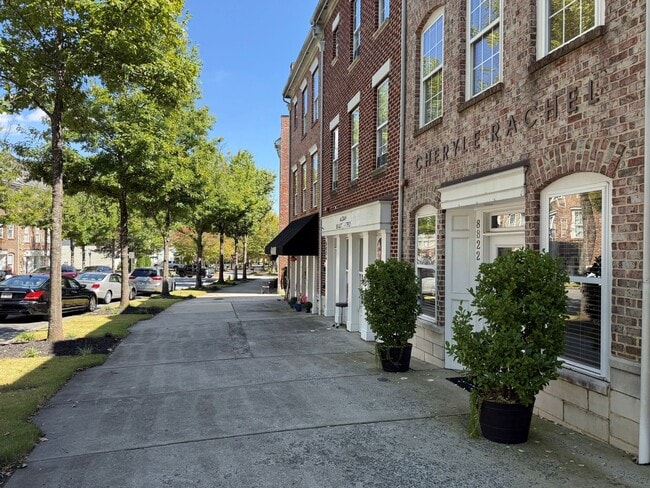 Building Photo - UPGRADES! Two Bedroom Townhouse - Six Mont...
