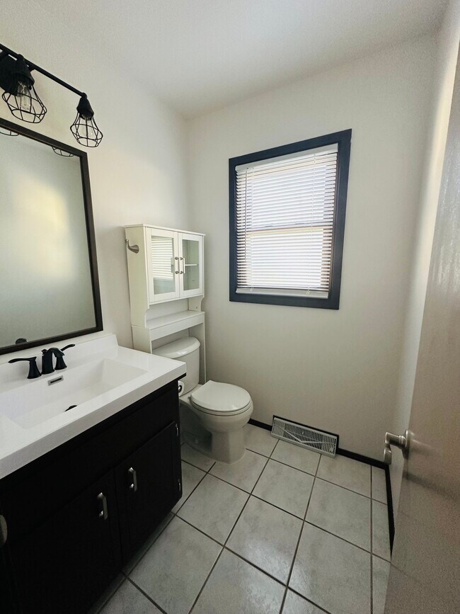 Half bath on main level - 3202 W Alvina Ave
