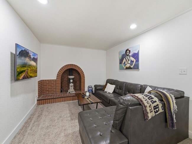 Building Photo - Bright Ranch Home with 2-Car Garage, Finished Basement, and Spacious Yard