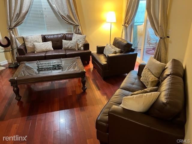 Building Photo - 3 br, 2.5 bath Condo - 600 E Magnolia Blvd...