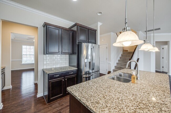 Building Photo - "Spacious 4-Bedroom Retreat with 3 Full Ba...