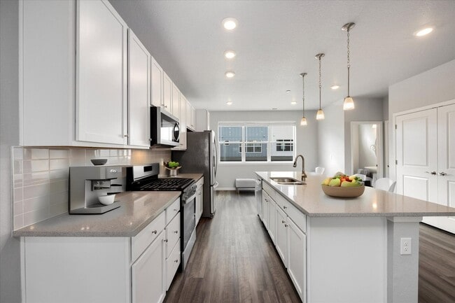 Building Photo - Gorgeous NEW Three Story Townhome with two car attached garage!