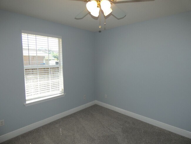 Building Photo - Charming 4-Bedroom Home With Sunroom