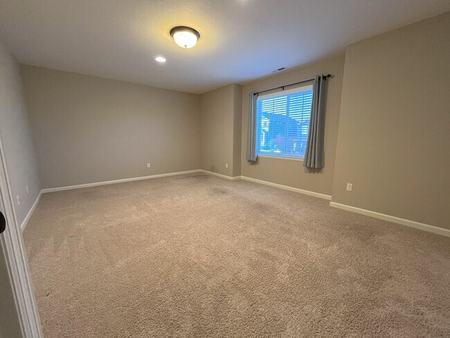 Building Photo - Spacious 4-Bedroom + Bonus Room with Modern Kitchen, Solar Panels & Private Fenced Backyard!