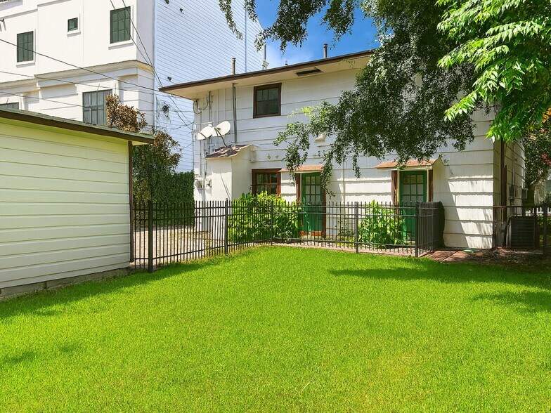 NEW! A safe area for your pets to run around. The backyard is fully fenced in. - 3911 Law St