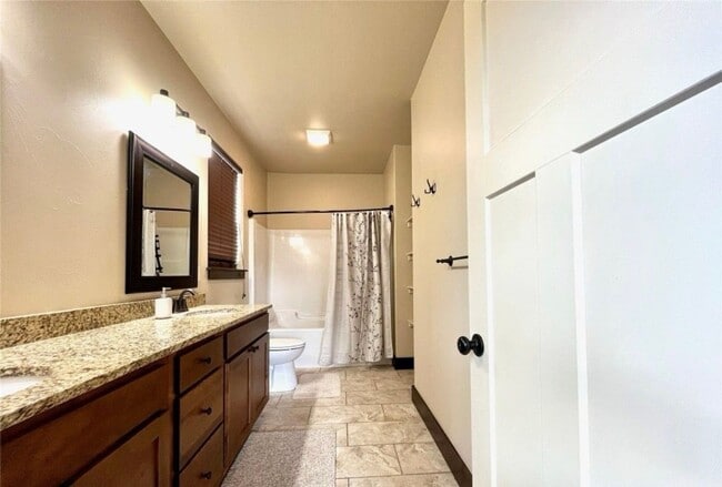 Building Photo - Charming 4-Bedroom Home with Spacious Lawn...