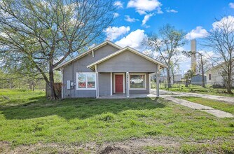 Building Photo - White picket fence cottage, ready to be your next home!