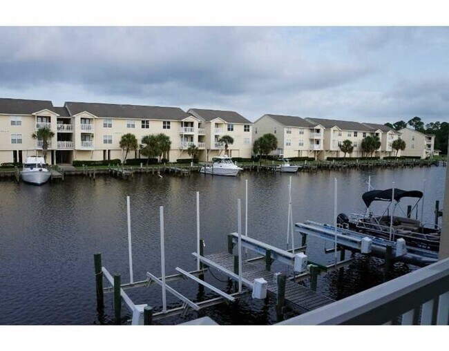 Building Photo - WATERFRONT LIVING! BEAUTIFULLY APPOINTED CONDO ON THE BAYOU IN OS SCHOOL DIST - FULLY FURNISHED