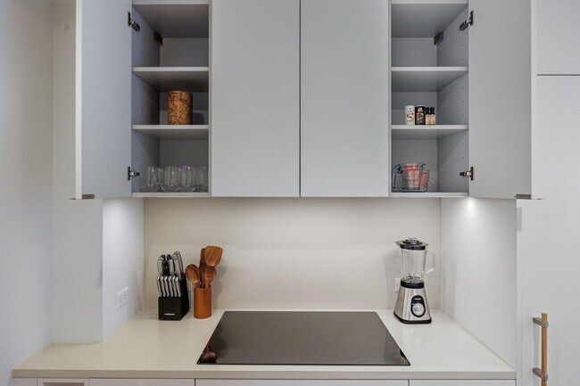 Building Photo - 4-75-75 48th Ave