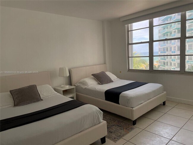 Building Photo - 5151 Collins Ave