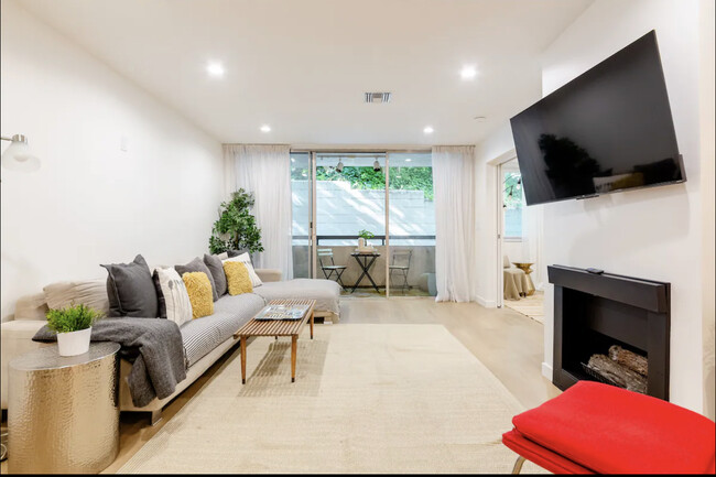 Living room facing patio - 8535 Knoll N W Dr