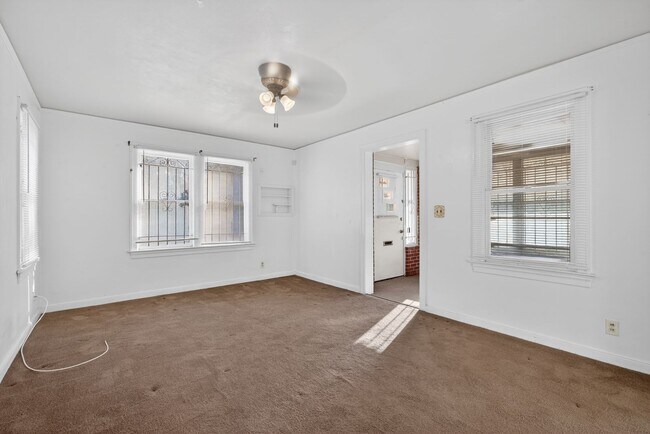 Building Photo - Spacious 3-Bedroom Corner Home with Garage & Private Courtyard