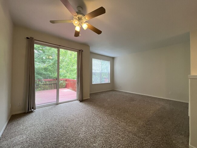 Building Photo - Spacious Three-Story Townhome Near Orenco Station with Attached Garage, Private Balcony, and Vaul...