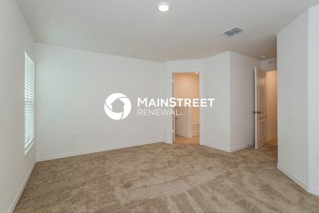 Building Photo - 4 Bedroom Pet-Friendly Home in Mascotte, FL with Main Street Renewal