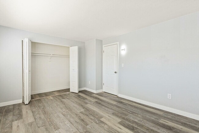 Explore this contemporary bedroom, designed for comfort and style. - Country Club