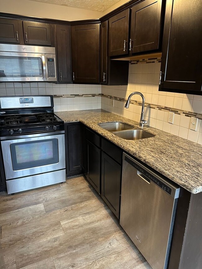 Primary Photo - Updated 3 Bed 1.5 Bath Townhome with basem...