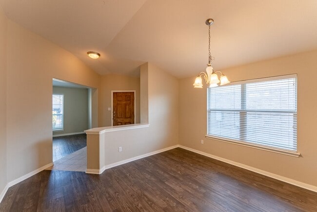 Building Photo - Charming Brick Home with Open Floorplan, Vaulted Ceilings, and Luxurious Amenities—Perfect for An...