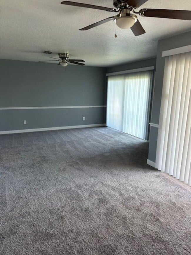 Building Photo - Spacious Townhome  with Stunning Water Views