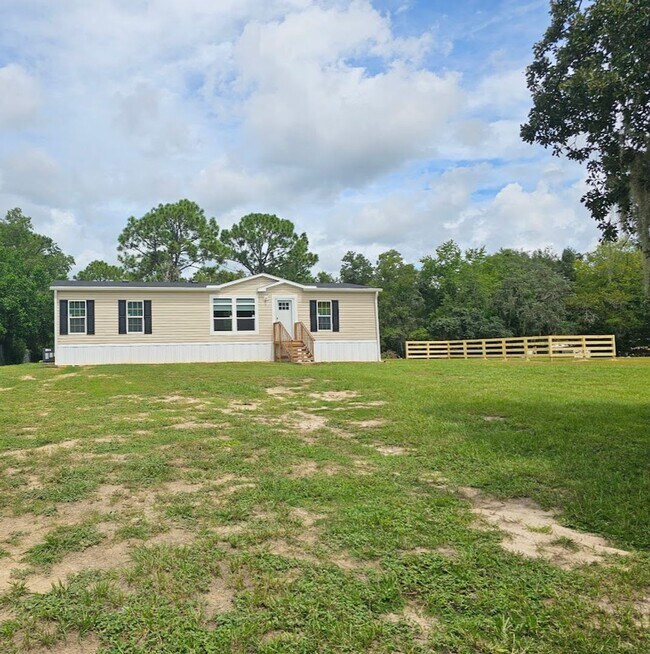 Building Photo - Welcome Home! Spacious 3-Bed, 2-Bath Split Floor Plan on ¾ Acre Lot