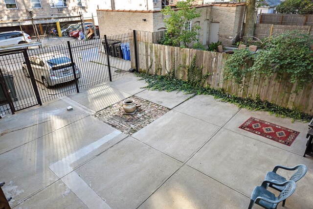 Rear patio and parking spot - 5923 N Winthrop Ave