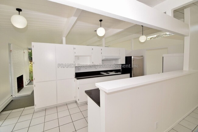 Building Photo - "Charming 4-Bedroom Oasis in San Rafael – ...