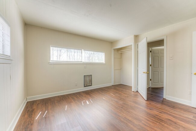 Building Photo - Rent reduced! Move-in special - 1/2 off Fi...