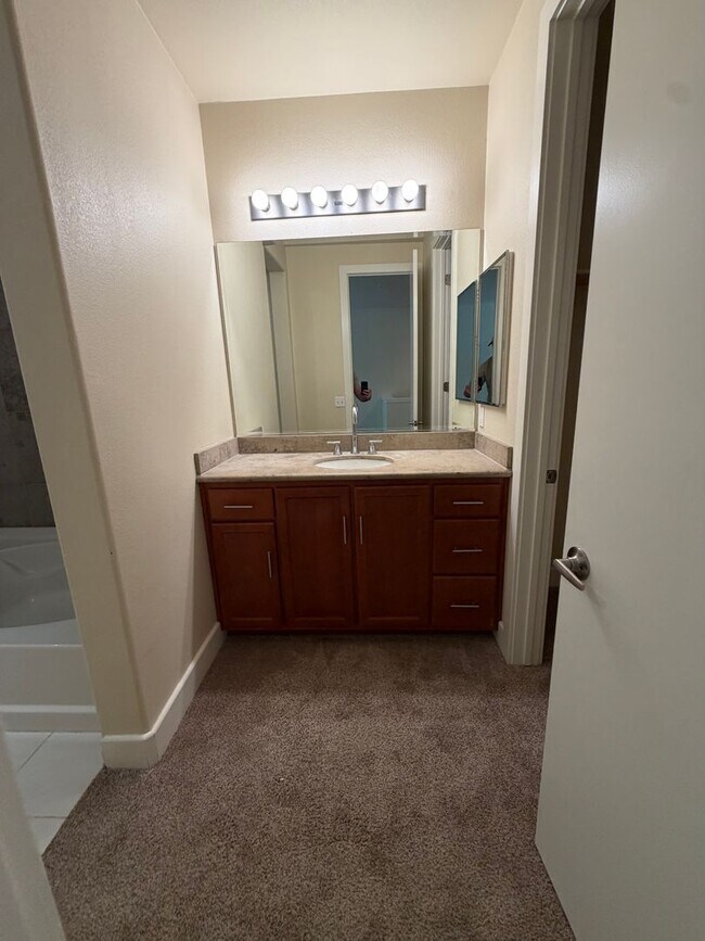 Building Photo - 7034-7046 Santero Way Lofts