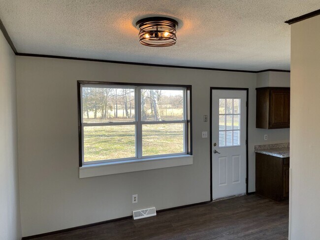 Building Photo - Rogersville Living at a great price .