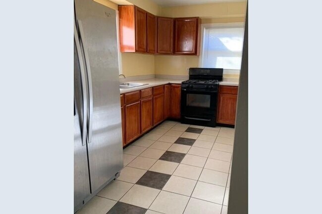 Building Photo - 16122 Wolcott Ave