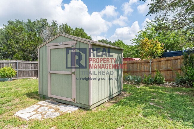 Building Photo - Well-Maintained Home with Large Yard and Storage Shed