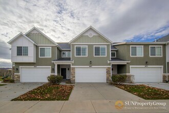 Building Photo - Stunning Townhome In Desirable Riverton Area