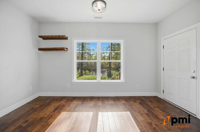 Building Photo - Stunning 5 Bedroom Waterfront Home with 2 car garage