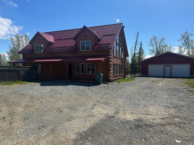 Building Photo - Gorgeous Log Home with infloor heat.  Two level lots with RV parking and dumpstation.