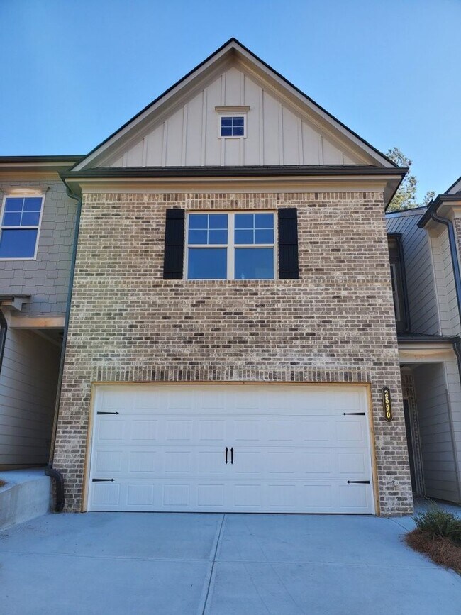 Primary Photo - Charming 3-Bedroom Townhome with Stylish F...