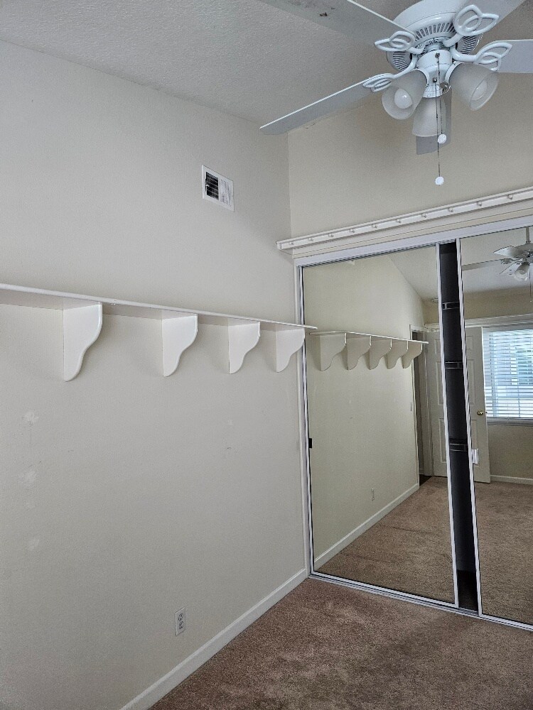 hall bedroom shelf and mirror closet doors - 7532 Seaspring Dr