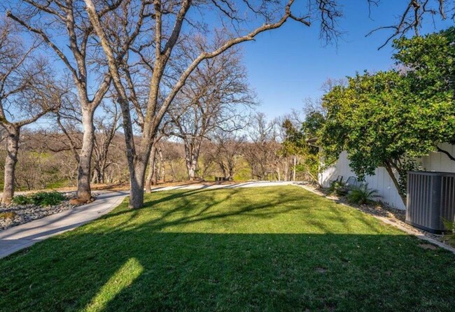 Building Photo - A Private Oasis with Unmatched Amenities 4 Bedroom 3 Bath